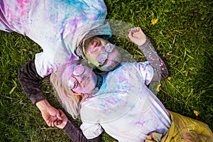 Portrait of a happy European couple celebrating Holi