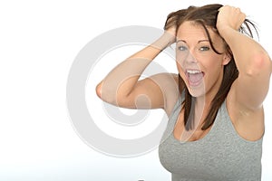 Portrait of a Happy Excited Attractive Young Woman Smiling and Pulling Hair