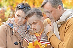 Portrait of Happy family in autumn park