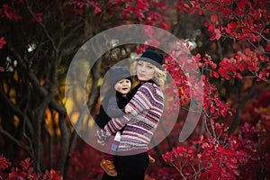 Portrait of happy family, autumn park outdoors