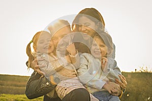 Portrait of happy family. Outdoors.