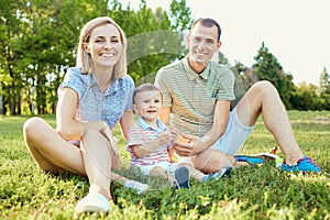 Portrait of a happy family in the park.