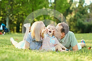 Portrait of a happy family in the park.