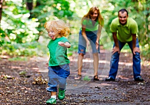 Portrait of Happy Family In Park