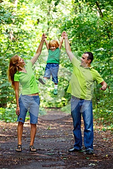 Portrait of Happy Family In Park