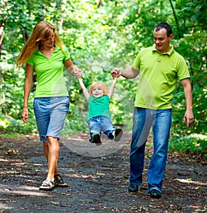 Portrait of Happy Family In Park