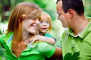 Portrait of Happy Family In Park