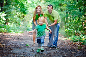 Portrait of Happy Family In Park