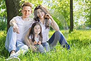 Portrait of happy family in park