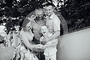 Portrait of Happy Family In Park - outdoor shot