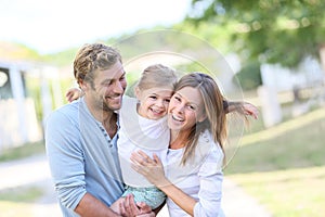 Portrait of happy family spedning time together