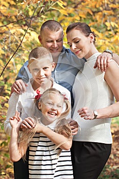 Portrait of happy family with two children