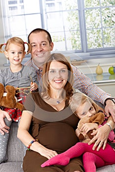 Portrait of happy family with two daughters