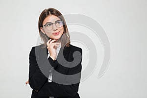 Portrait of a happy female manager in eyeglasses