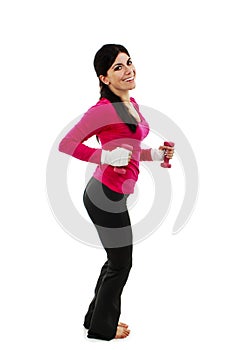 Happy fitness woman working out with free weights