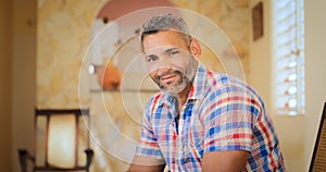 Portrait Happy Gay Man Looking At Camera Indoors