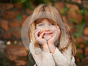 Portrait, happy and girl child in garden for learning, fun or playing in on vacation, break or holiday in nature. Face