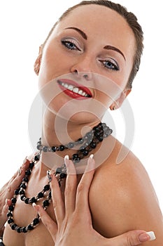 Portrait of happy girl with necklace