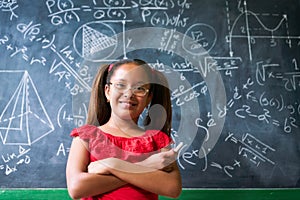 Portrait Happy Girl Resolving Complex Math Problem On Blackboard