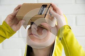 Portrait of happy girl in vr glasses. Virtual reality concept. People using technology. Futuristic background