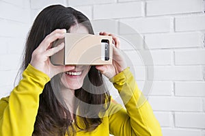 Portrait of happy girl in vr glasses. Virtual reality concept. People using technology. Futuristic background