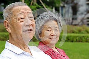 Portrait of happy grandfather and grandmother