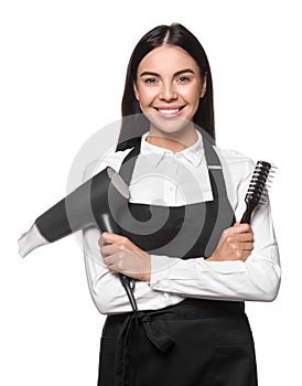 Portrait of happy hairdresser with hairdryer and vent brush on white background
