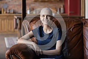 Portrait of happy hairless female oncology patient