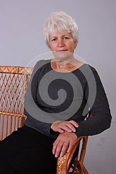 portrait of happy healthy middle aged woman, Smiling pleasant elderly mother looking at camera, posing for photo