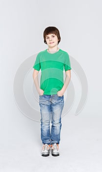 Portrait of happy joyful handsome little boy on white background