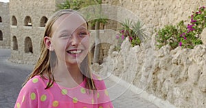 Portrait happy joyful teen girl tourist laughing resting on tropical resort.