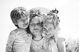 Portrait of a happy laughing children. Smiling kids with face art painting. Child huds with funny face painting.