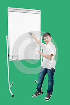 Portrait of happy little boy showing white blank board