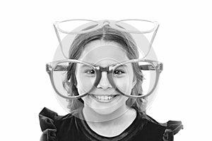 Portrait of happy little child. Birthday party. Little girl in party glasses. small girl greeting summer. Childhood and