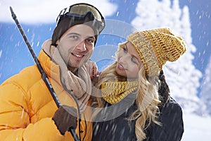 Portrait of happy loving couple at wintertime