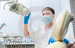 Portrait of a happy male dentist photo