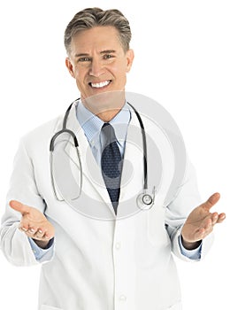 Portrait Of Happy Male Doctor Gesturing photo