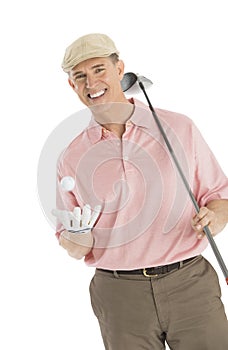 Portrait Of Happy Man With Golf Club And Ball