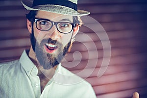 Portrait of happy man wearing hat and eyeglasses