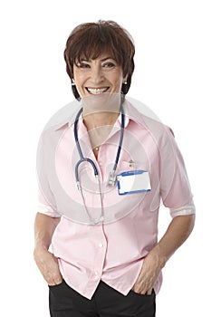 Portrait of happy mature female doctor