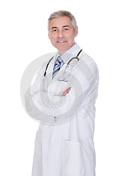 Portrait of happy mature male doctor