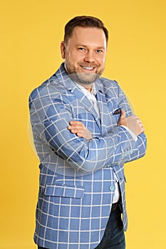 Portrait of happy mature man on background