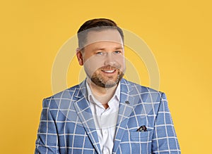 Portrait of happy mature man on background