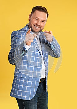 Portrait of happy mature man on background