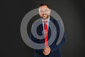 Portrait of happy mature man on background