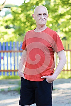 Portrait happy mature older man is smiling.