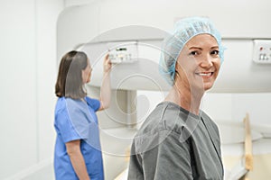 Portrait Of Happy Mature Woman Smiling As Patient In Clinic