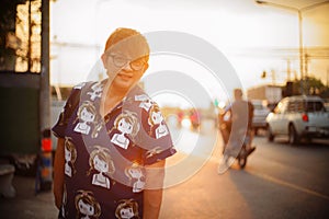 Portrait happy mature woman at sunset moment,soft focus,filtered image,blurred background