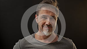 Portrait of happy mid adult man with confident smile