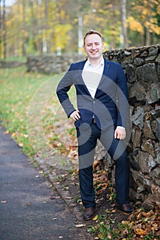 Portrait of happy middle-aged businessman